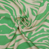Плательная ткань бежевая зеленый принт