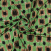 Трикотажная ткань светло-зеленая принт черный горох