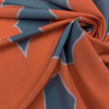 Трикотажная ткань синяя оранжевый принт цветы