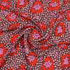 Трикотажная ткань коричневая принт красные цветы