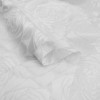 Ткань деворе из вискозы в белые цветы